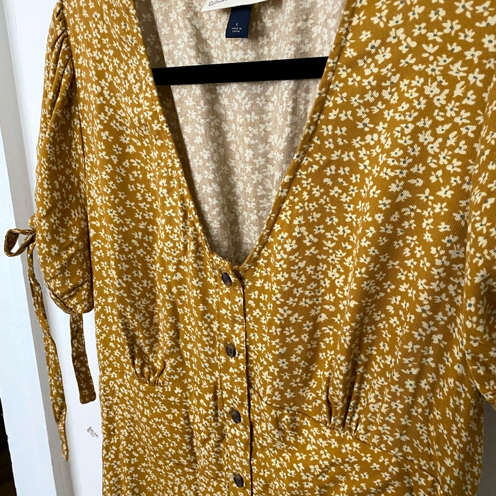Yellow floral dress with ties and cap sleeves